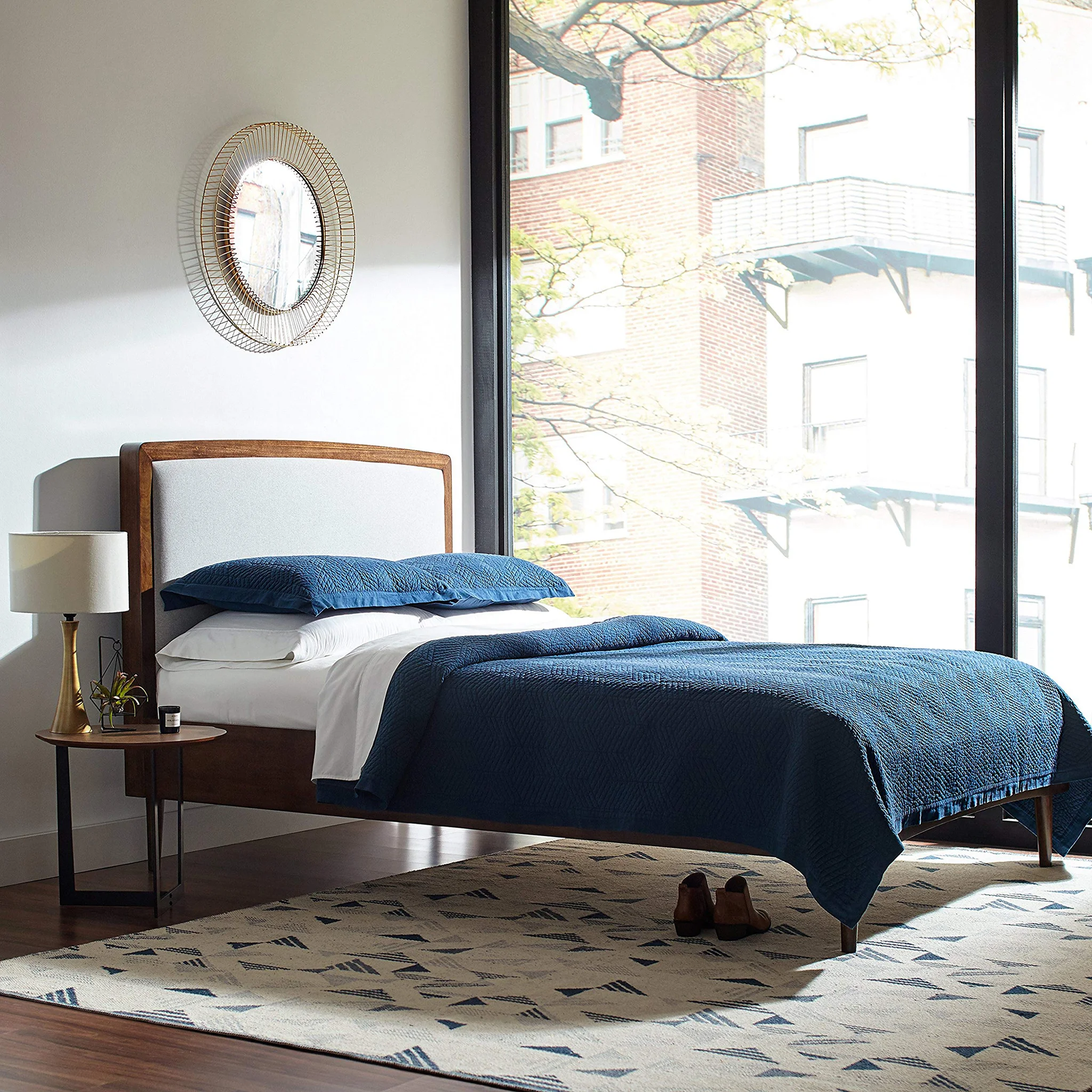 Mid-Century Modern Bedroom Scene with Geometric Area Rug